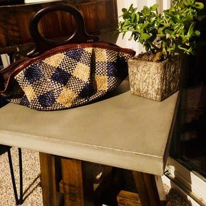 Gently used hand woven hand bag